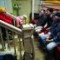Boxers gather to talk in between drills and sparring in the ring. Professional boxers Brian Camechis, left, and Cory Tipple, center right, have made Sam's Gym their boxing home.